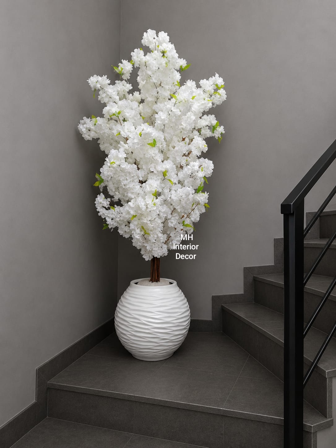 Elegant white artificial cherry blossom tree